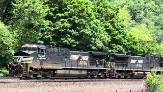 A Norfolk Southern freight train climbs through beautiful Horseshoe Curve