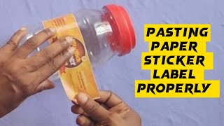 Pasting paper sticker label properly