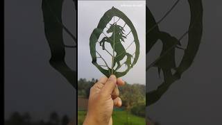 Leaf cutting art #leafart #leafcarving #artshortsvideo #artstyle #shortfeed