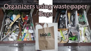 How to make organizers using waste paper bags.