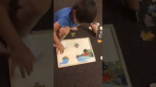 3 Years old kids playing puzzle