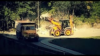 Экскаватор JCB 4CX. Погрузка строительного мусора. Backhoe loader JCB 4CX. Loading garbage.