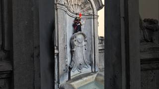 Pee-king in Brussels: Manneken Pis and His Legendary Stream 😂  #brussels #funnyvideo #funnyshort