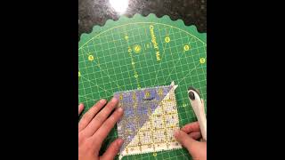 Rotating cutting mat and trim size ruler trimming HSTs