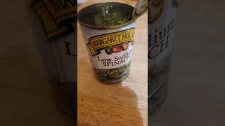 Spinach inside a can.