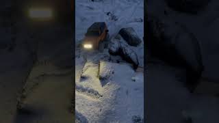 Rc car driving over rocks in snow #shorts #traxxas #rccar #trx4 #fordbronco