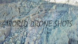 Drone shot wide moving up of miners walking up the crater wall, Ijen volcano (Kawah Ijen), Java,  4k