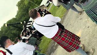 the brown haired made, real, played by a mask pipes and drums band. for @piperdemi6455