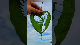 Leaf cutting art|A strong women#shortsvideo#youtubeshorts#youtubeshortsvideo#leafcuttingart#art