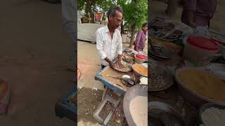 Hard working uncle selling Garam Bhunja