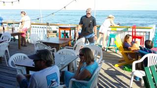 PLAPA BAR, AMBERFRIS CAYE. BELIZE. ON A PERFECT DAY! Scott the owner with Angela...