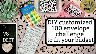 DIY customized 100 envelope savings challenge box using yard sale stickers to fit your budget