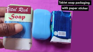 Tablet soap packaging with paper sticker