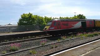 railtour at Rhyl passed by a 66 ballast train. May 2022