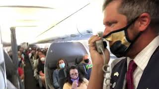 Flight Attendant sings “Country Roads” with passengers on American Airlines flight 1047 from VPS-DFW