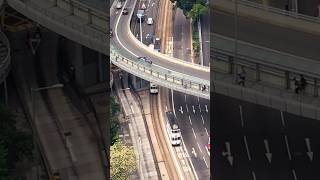 High above #hongkong #streetcar lines as #trolley cars take commuters through the city