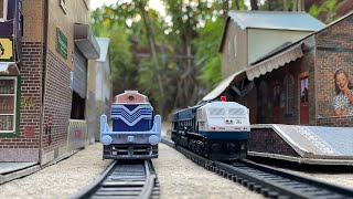 Centy Passenger Train and WDP4 Locomotive passing through Sam City