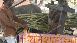 The Indian Way of Sugar Cane Juice Making Popular Summer Street Food