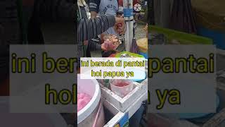 Beli Es Doger di Pantai Hol Papua