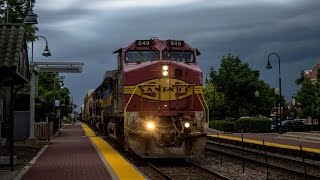 1080p HD: METX 403 West (METX 2715) and BNSF 649 East (CP 272) at Bensenville IL in storm conditions