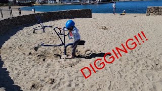 Excavating Fun: Riding the Park's Sand Pit with a Ride-On Excavator!