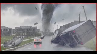 A tornado tears through a roadway as Hurricane Milton makes landfall in Florida as Category 3 storm