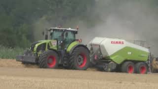 Stroh Pressen in mit Claas Traktor und Claas Groß Pacher presse und Telekoplader Große Strohballen L