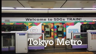 Watching Tokyo Metro trains at Omotesando station, Tokyo.