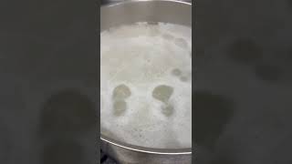 Boiling rice in big pot