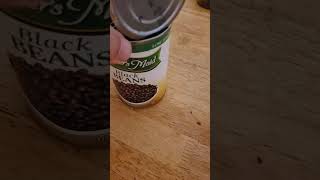 Empty black beans can.