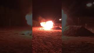 Throwing 5 Aerosol Cans in a Bonfire