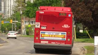 TTC Orion VII NG HEV #1654 leaving Jane and Lawrence