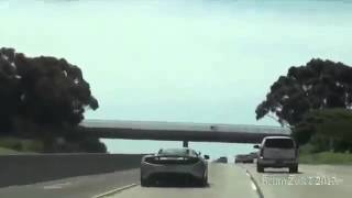 McLaren MP4 12C Weaving On Freeway