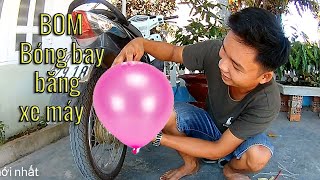 bom tất cả bông bóng bay bằng bô xe moto