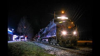 NS 8101 leads CN M338 in Addison, Illinois.