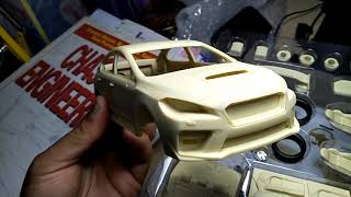 SubarU Version 10 . 1/24 Model Kit Unboxing by Modeller