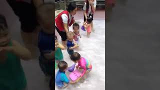 Toddlers swimming in the pool ( Petey was about 17 months old)