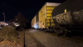 CSX 970 ES44AH leads CSX M410 hauling ass through Piscataway