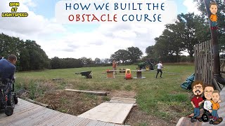 Kids Strongman / Parkour inspired obstacle course built in a field with various farm materials