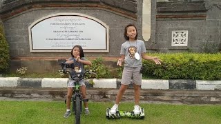 Berolahraga bermain sepeda dan Hoverboard