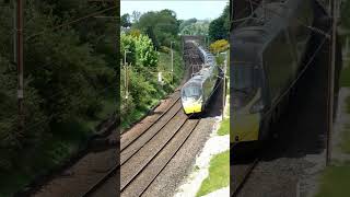 390131 passing under Cleveley Bridge south of Lancaster