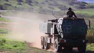 US Marines M142 HIMARS . High Mobility Rocket System Shooting.