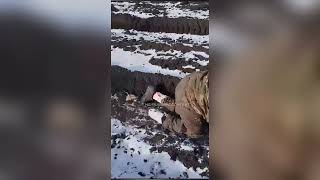 Russian soldier named Maga treats his own injuries after breaking his leg after falling from a plane