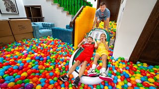 Kids fill the whole house with plastic balls