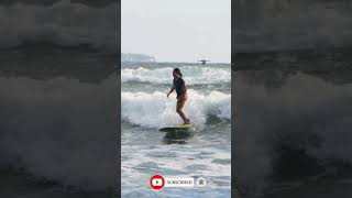 Handheld Wide Shot Tracking Surfer Riding Wave