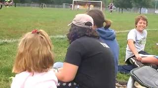 Family watching Jensen play soccer