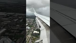 Flying past rain: American 737-800