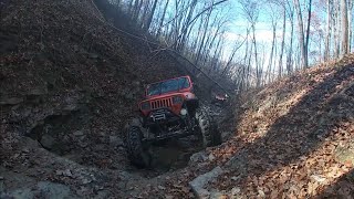 CREEK CRAWLIN @ HASPIN ACRES  JEEPS TAKE ON ROCK LEDGES