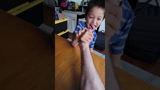 Young Veggie-Eating Champion Defeats Daddy in Epic Arm Wrestling Showdown!