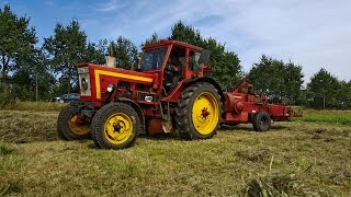 Heu schwaden und Pressen mit Massey Ferguson und Belarus